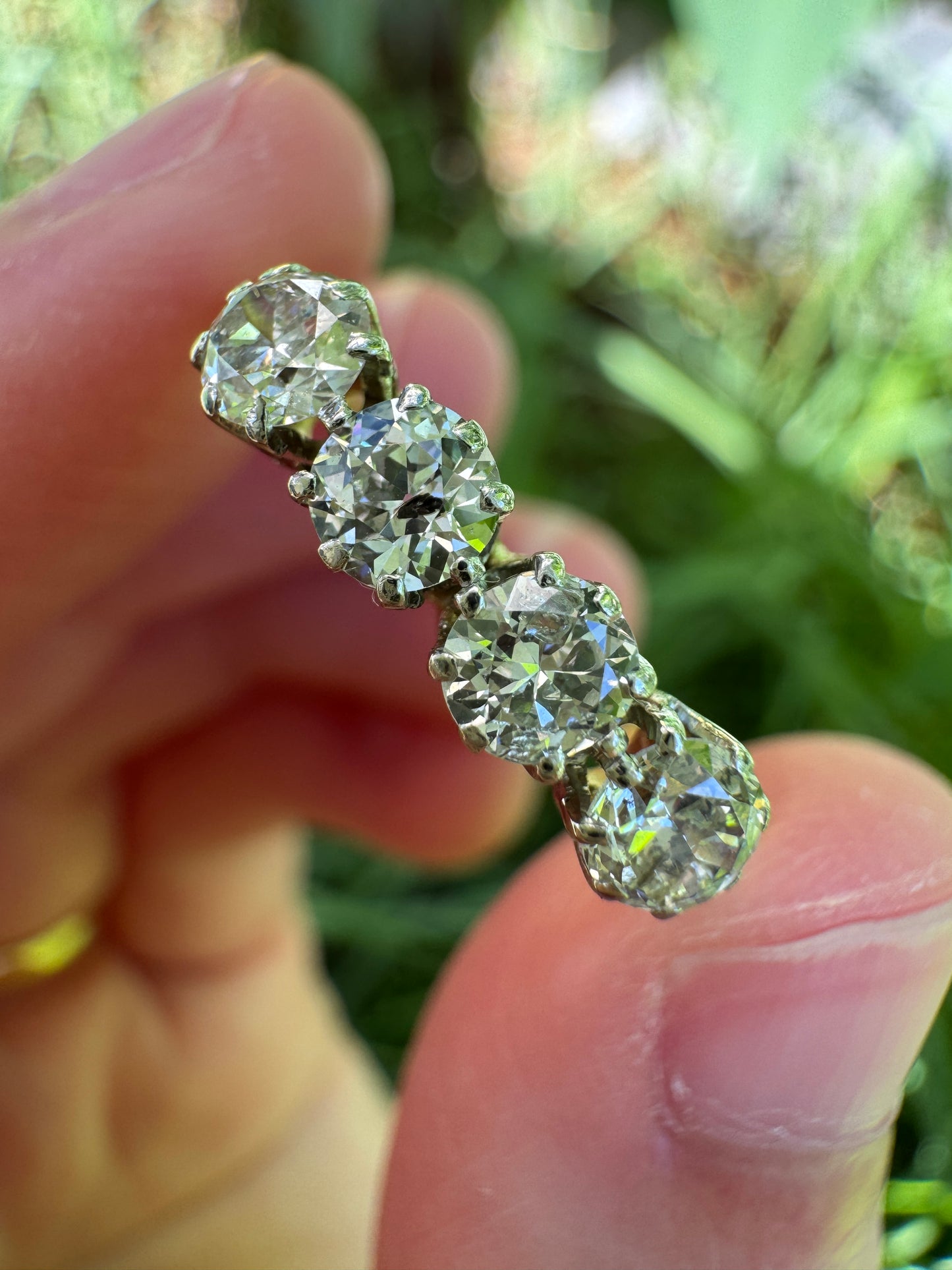 Vintage 18ct yellow gold and platinum four stone 0.76ct TCW old mine cut diamond ring