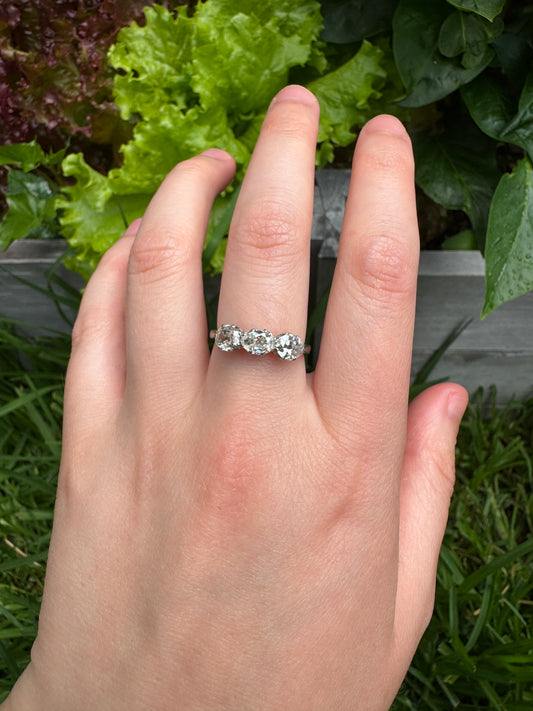 Vintage platinum 1.12ct TCW three stone old mine cut diamond ring