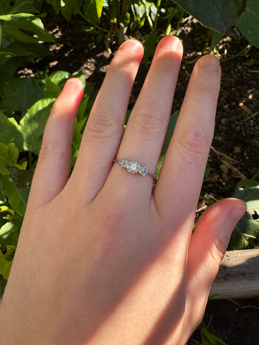Vintage 18ct white gold and platinum three stone 0.16ct TCW old mine cut and old European cut diamond ring