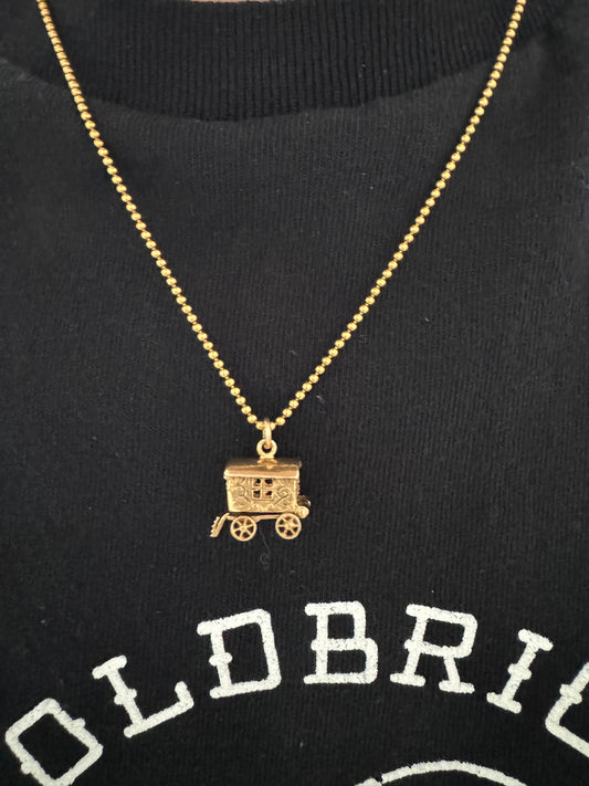 Vintage 9ct yellow gold opening caravan charm