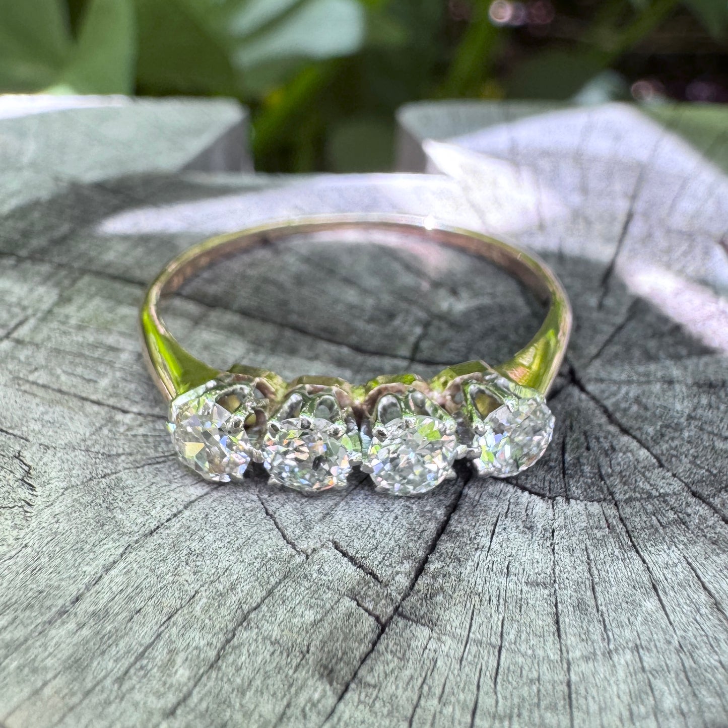 Vintage 18ct yellow gold and platinum four stone 0.76ct TCW old mine cut diamond ring