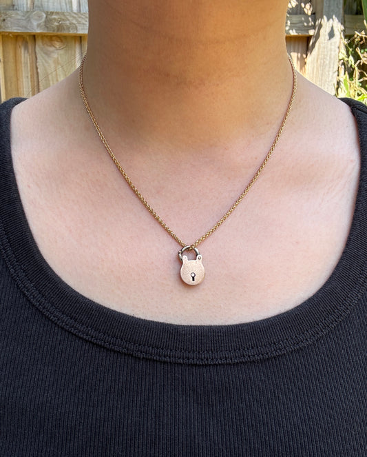 Antique 9ct rose gold padlock pendant