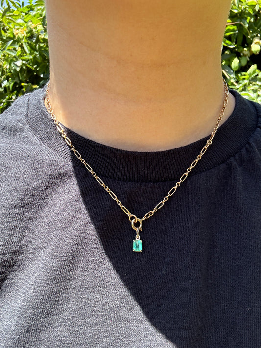 Custom 9ct yellow gold 0.56ct emerald claw set pendant