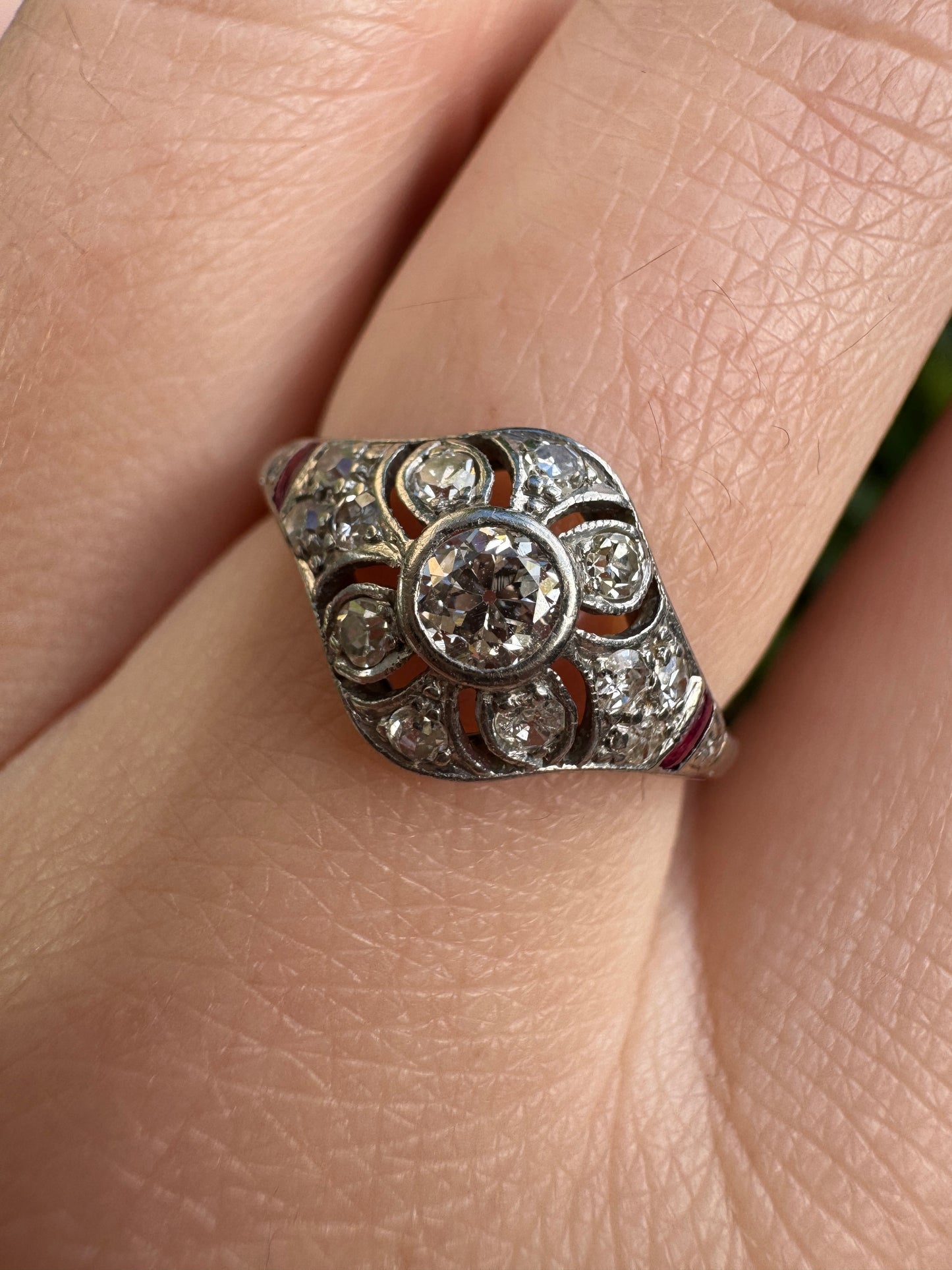Antique platinum 0.17ct old mine cut and 0.12ct TCW old single cut diamond ring with accent ruby cabochons