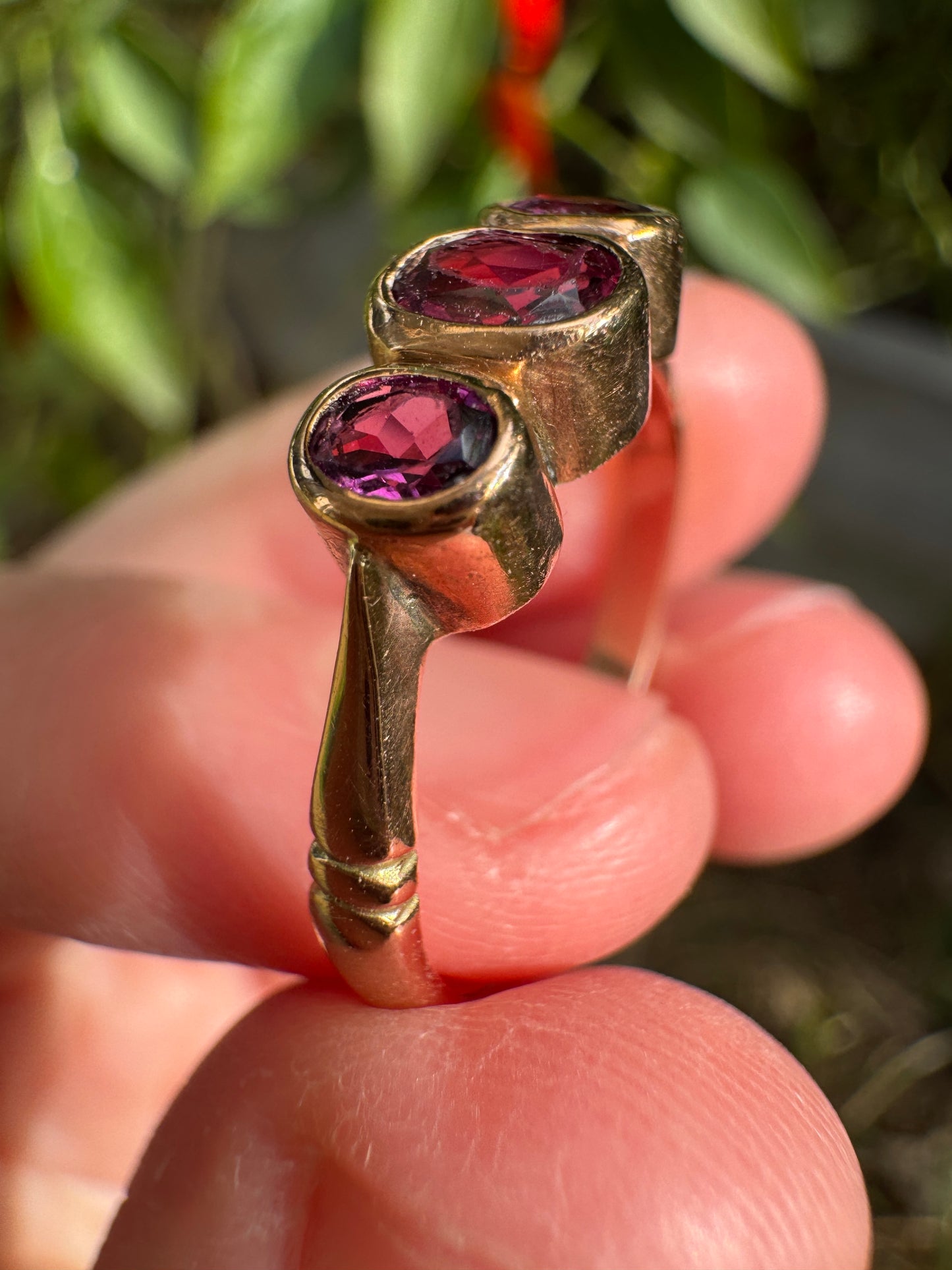 Antique 9ct rose gold three stone 0.7ct TCW garnet bezel set ring
