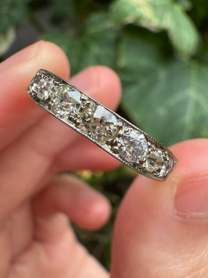 Vintage platinum 0.7ct TCW old mine cut diamond engraved half eternity ring