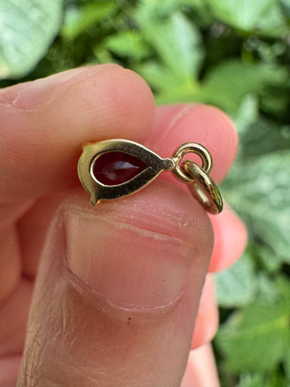 Custom 9ct yellow gold 0.68ct pear cut garnet pendant