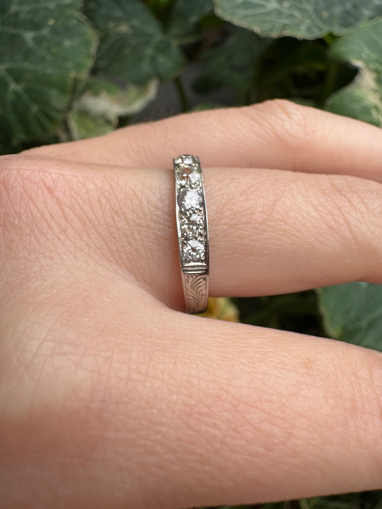 Vintage platinum 0.7ct TCW old mine cut diamond engraved half eternity ring