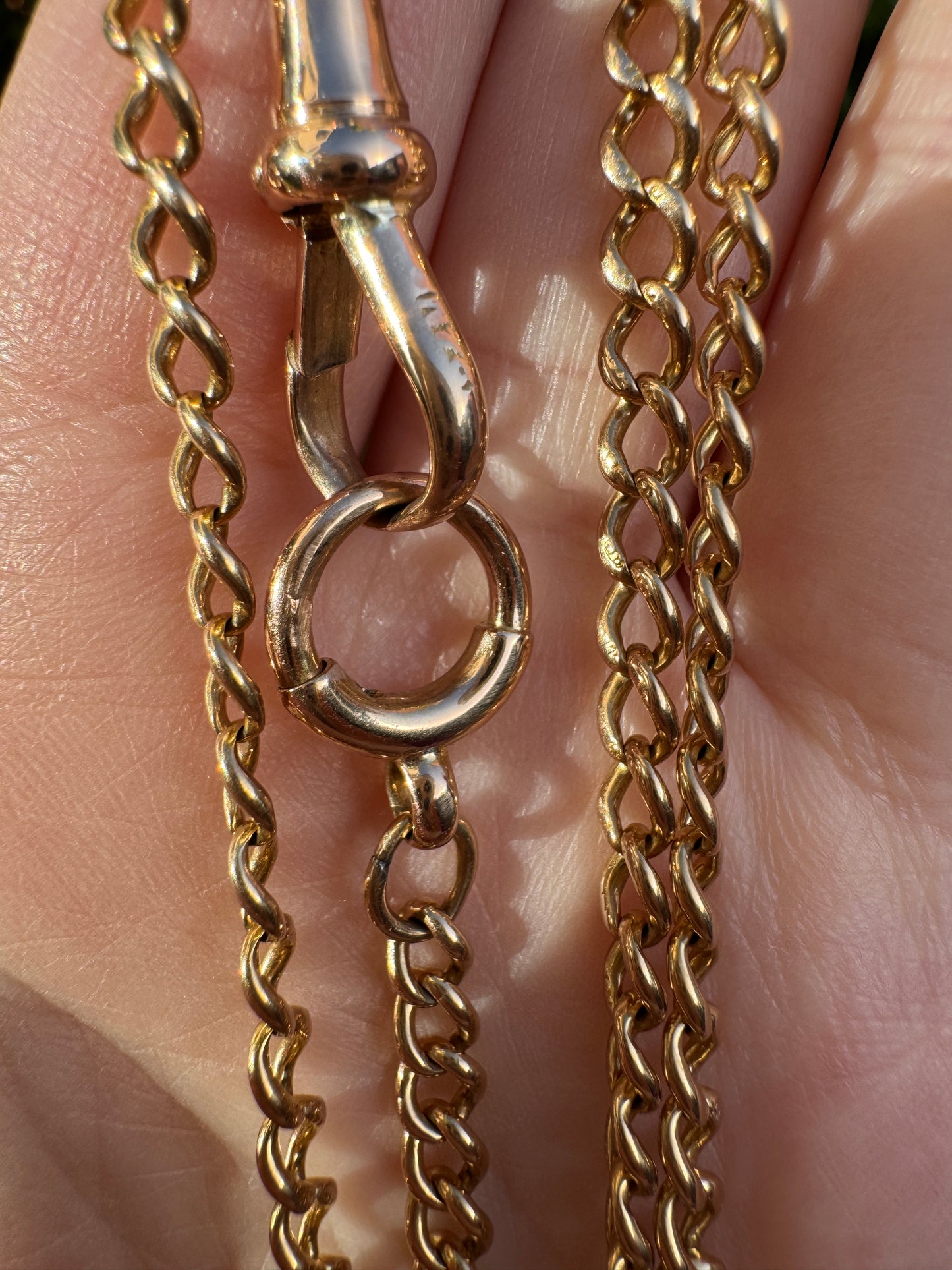 Antique 15ct yellow gold curb link watch chain with dog clip, 53.5cm / 21.06 inches long