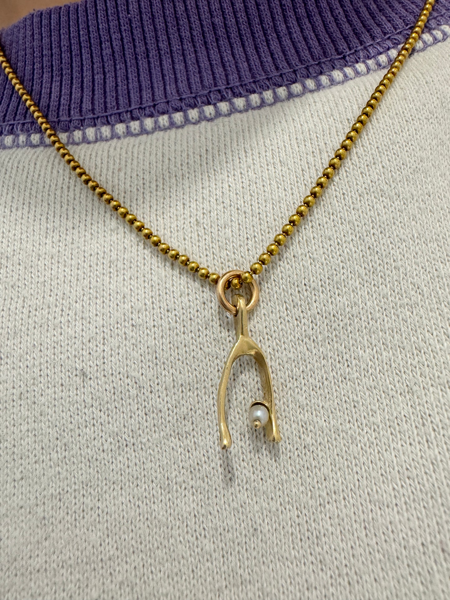 Vintage 14ct yellow gold and pearl wishbone charm