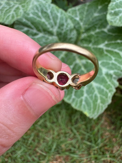 Antique 18ct yellow gold three stone 0.95ct flat cut garnet and 0.45ct TCW old European cut diamond ring
