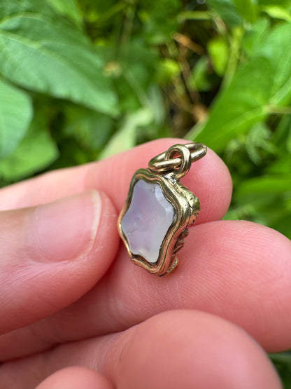 Antique gilt metal heart and Cupid's arrow white chalcedony intaglio pendant