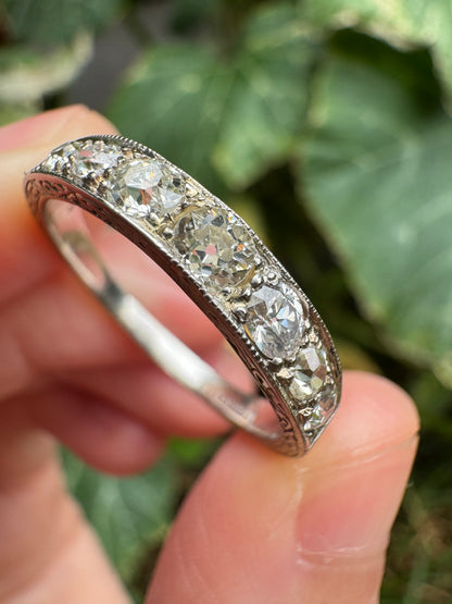 Vintage platinum 0.7ct TCW old mine cut diamond engraved half eternity ring