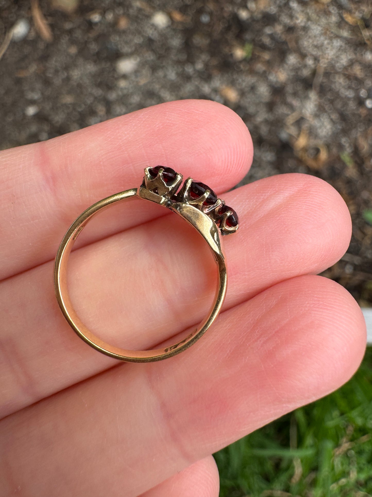 Antique Australian 18ct yellow gold three stone 0.46ct TCW garnet crossover ring