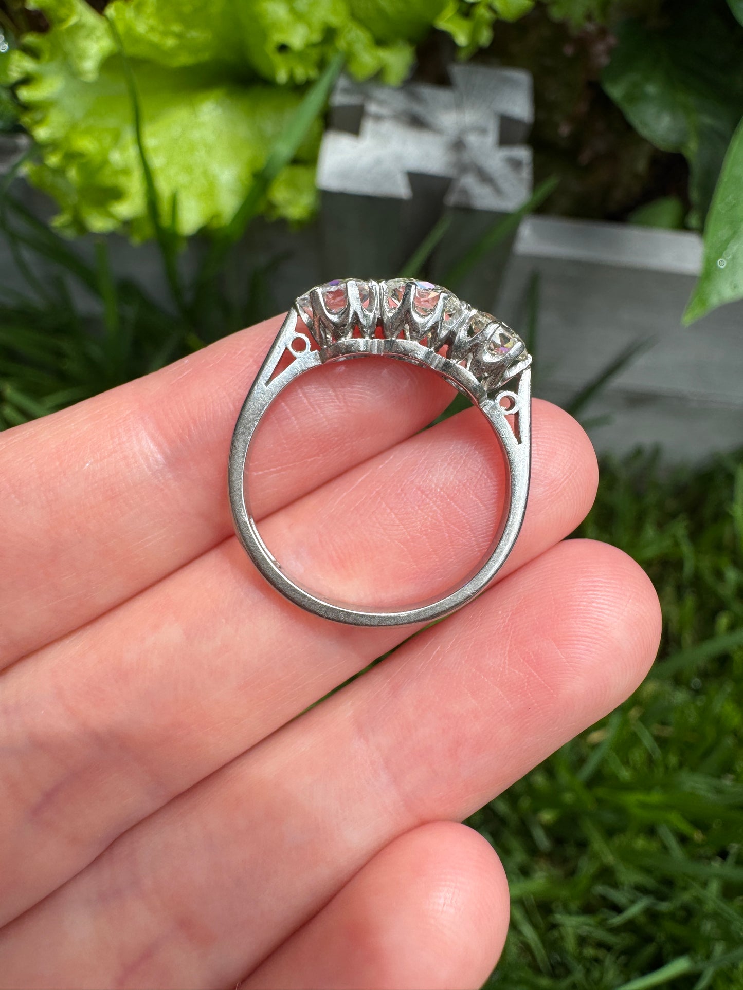 Vintage platinum 1.12ct TCW three stone old mine cut diamond ring