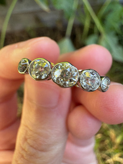 Vintage 18ct yellow gold and platinum five stone 0.69ct TCW old mine cut diamond bezel set ring