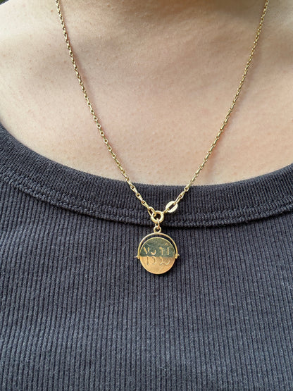 Vintage 9ct yellow gold good luck spinner charm
