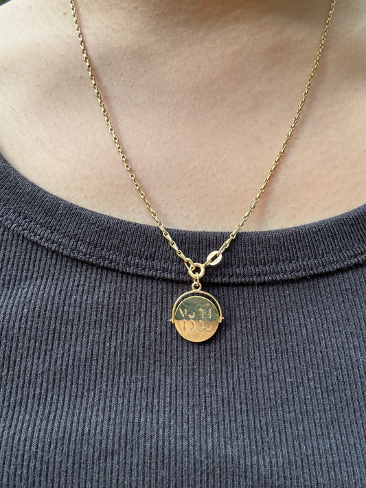 Vintage 9ct yellow gold good luck spinner charm
