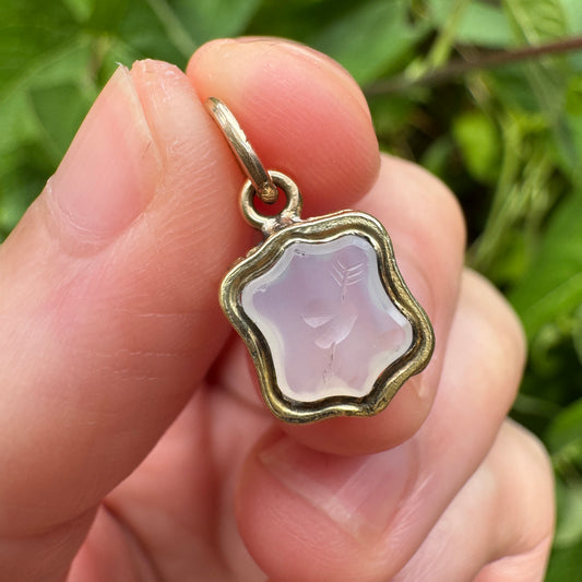 Antique gilt metal heart and Cupid's arrow white chalcedony intaglio pendant