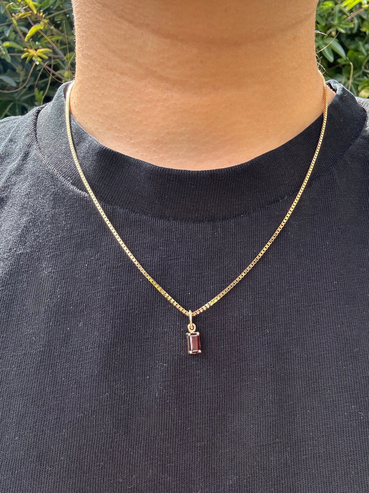Custom 9ct yellow gold 0.68ct emerald cut garnet pendant