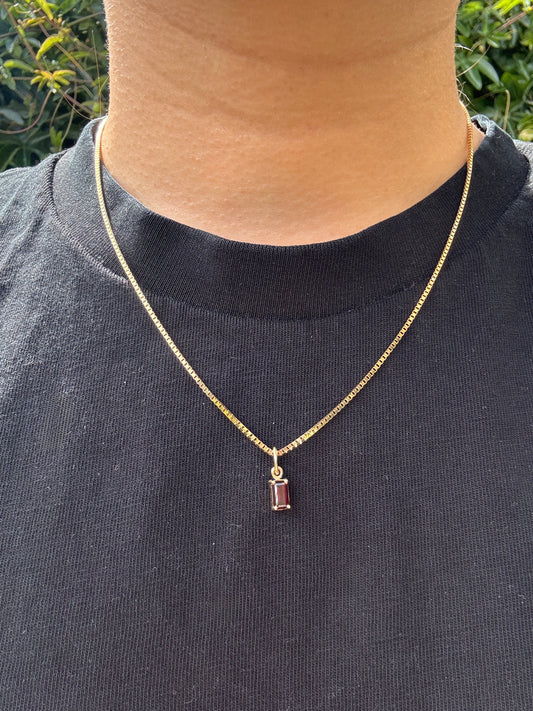Custom 9ct yellow gold 0.68ct emerald cut garnet pendant