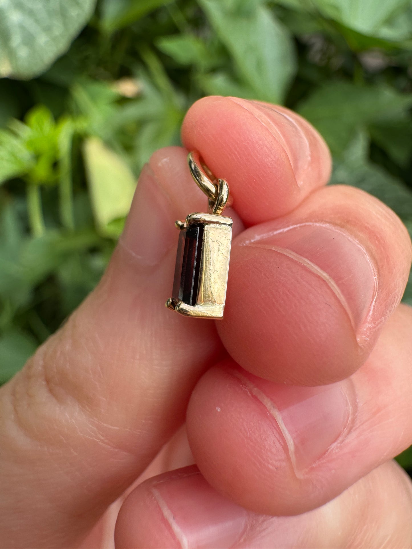 Custom 9ct yellow gold 0.68ct emerald cut garnet pendant