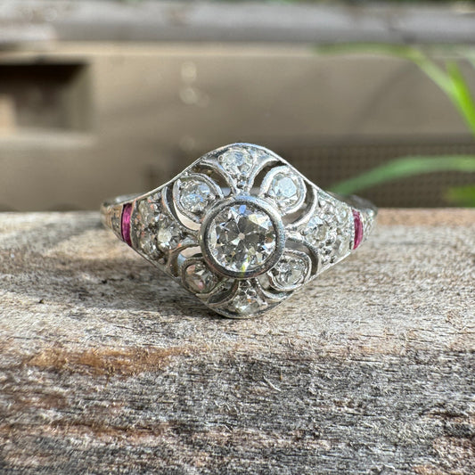 Antique platinum 0.17ct old mine cut and 0.12ct TCW old single cut diamond ring with accent ruby cabochons