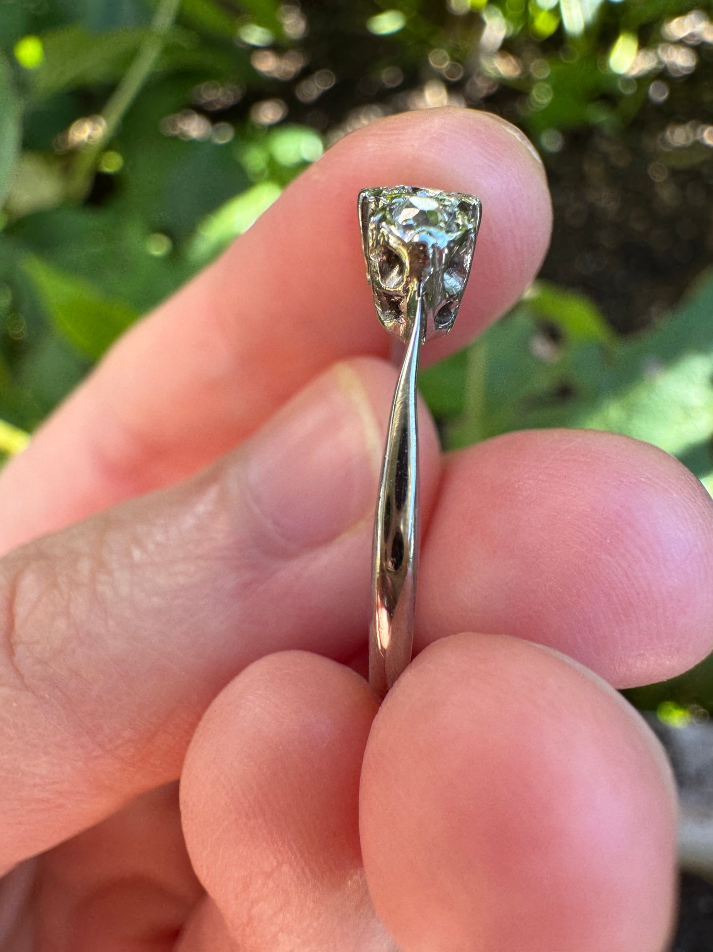 Vintage 18ct white gold and platinum three stone 0.16ct TCW old mine cut and old European cut diamond ring