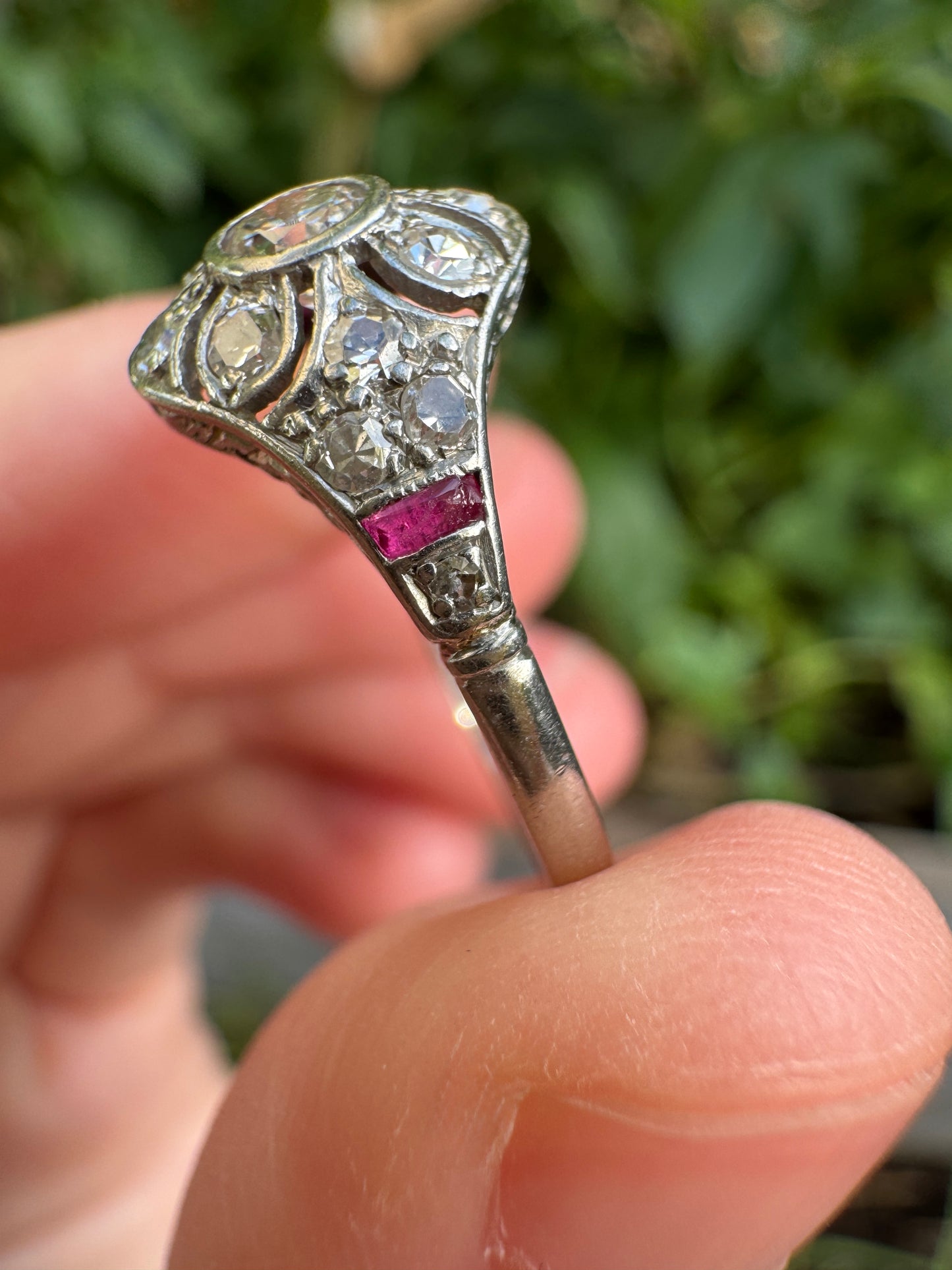 Antique platinum 0.17ct old mine cut and 0.12ct TCW old single cut diamond ring with accent ruby cabochons