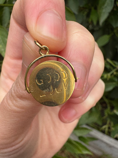 Vintage 9ct yellow gold good luck spinner charm