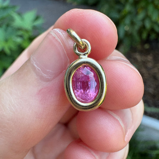 Custom 9ct yellow gold 0.72ct pink sapphire bezel set pendant