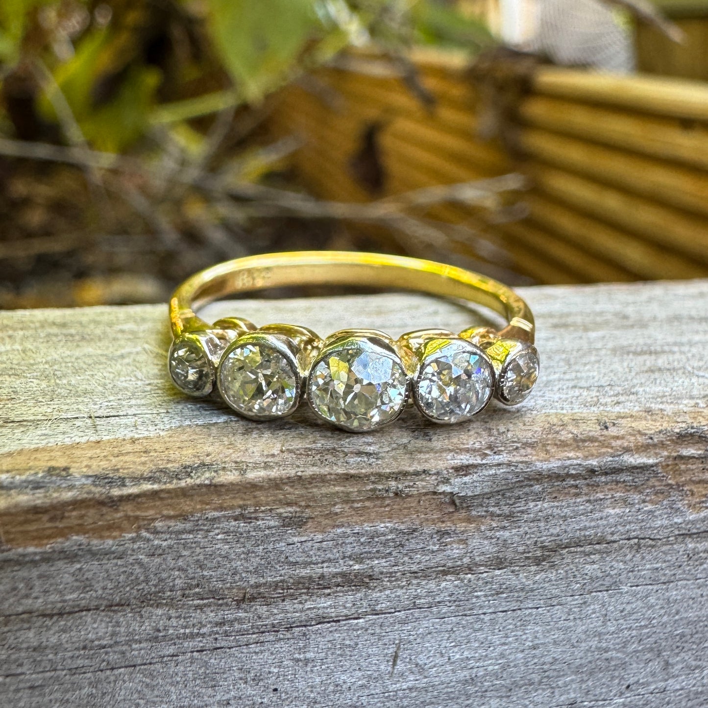 Vintage 18ct yellow gold and platinum five stone 0.69ct TCW old mine cut diamond bezel set ring