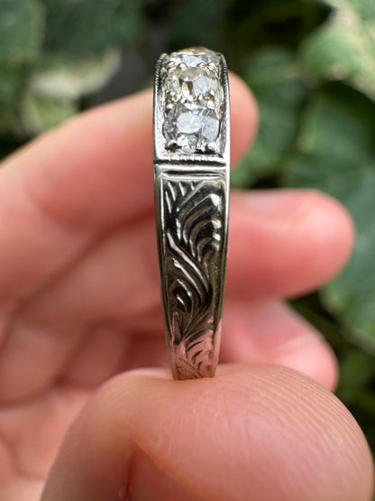 Vintage platinum 0.7ct TCW old mine cut diamond engraved half eternity ring