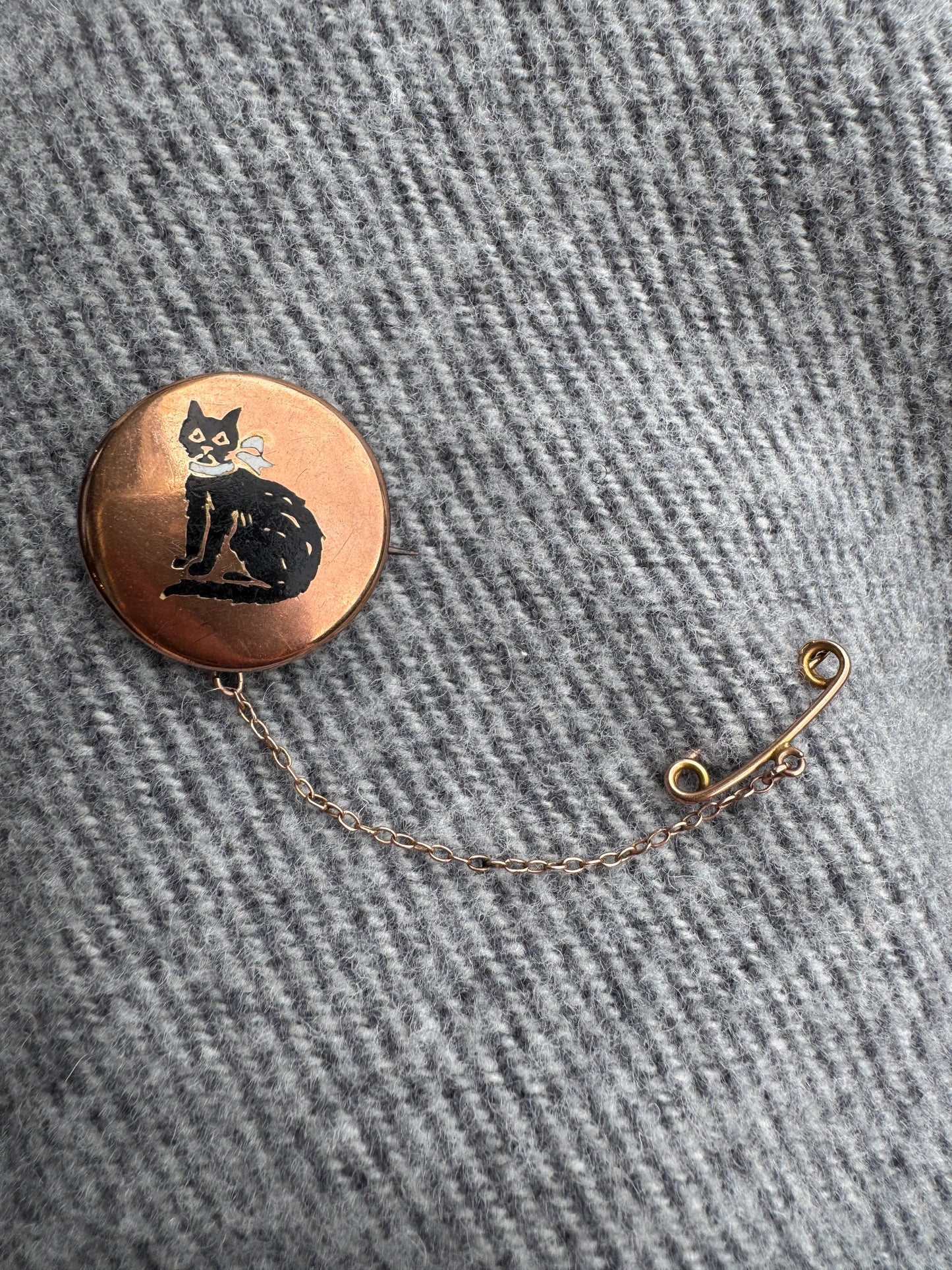 Antique 9ct rose gold enamel cat brooch with safety chain