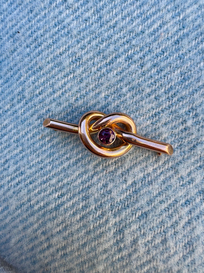 Antique 9ct rosy yellow gold 0.52ct garnet love knot brooch/chain extender