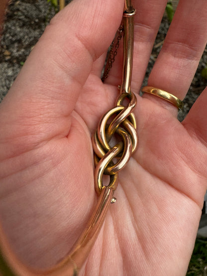 Vintage 9ct rosy yellow gold knot bangle