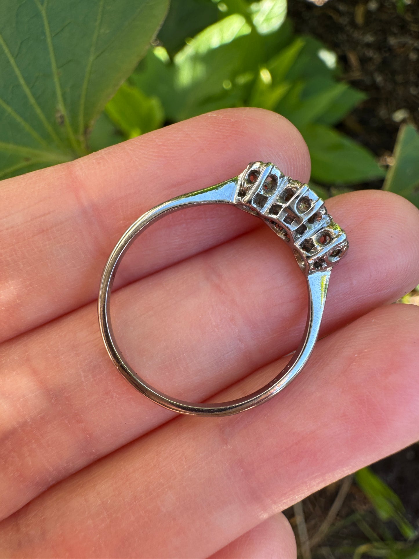 Vintage 18ct white gold and platinum three stone 0.16ct TCW old mine cut and old European cut diamond ring