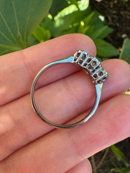 Vintage 18ct white gold and platinum three stone 0.16ct TCW old mine cut and old European cut diamond ring