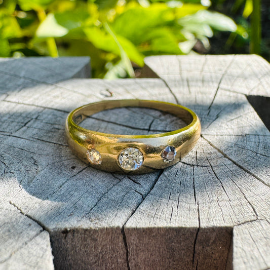 Vintage 18ct yellow gold 0.2ct TCW three stone old mine cut and single cut diamond gypsy ring