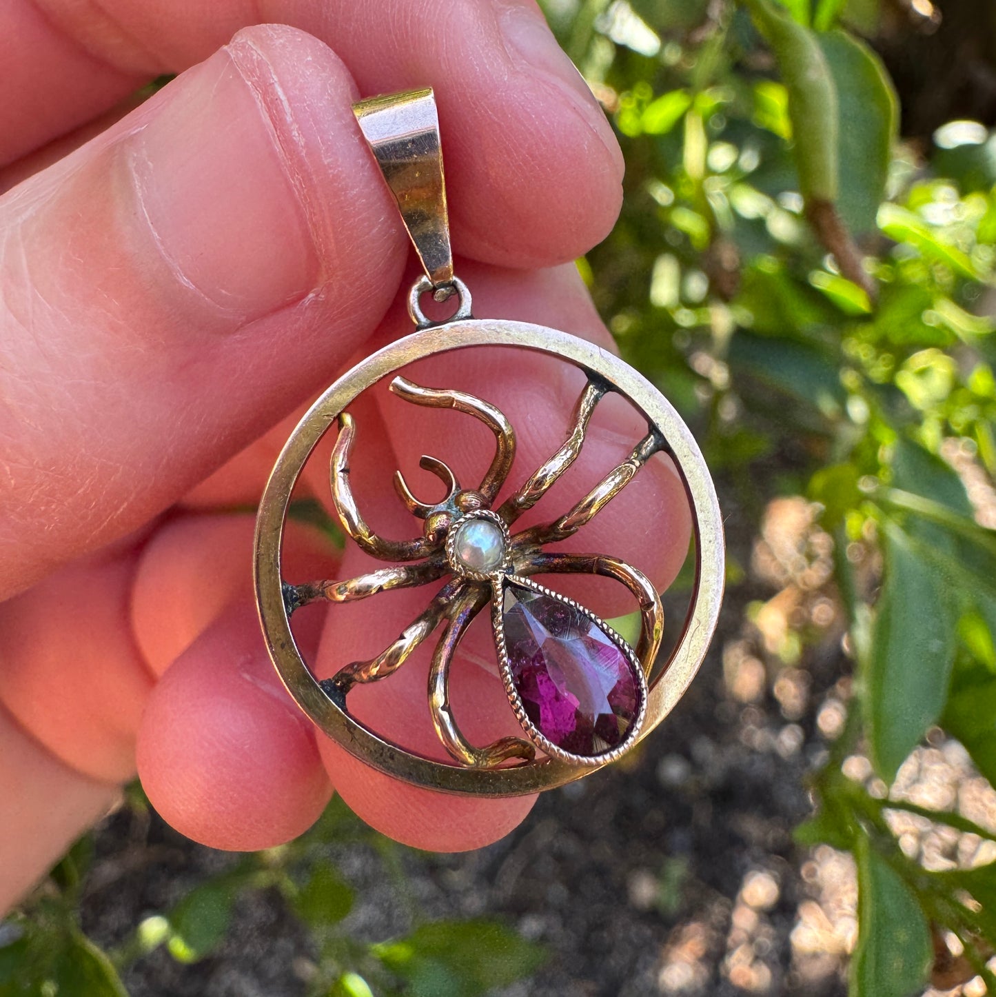Antique 9ct yellow gold 0.6ct garnet and pearl spider pendant