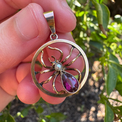 Antique 9ct yellow gold 0.6ct garnet and pearl spider pendant