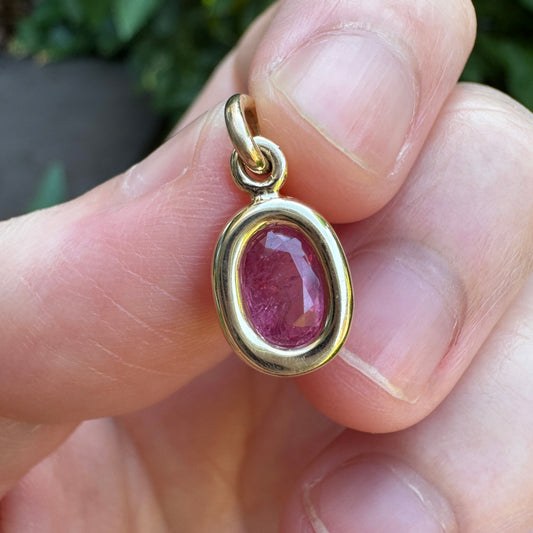 Custom 9ct yellow gold 0.8ct pink sapphire bezel set pendant