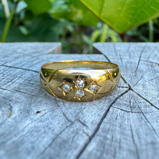 Vintage 18ct yellow gold four stone 0.13ct TCW old cut diamond gypsy ring
