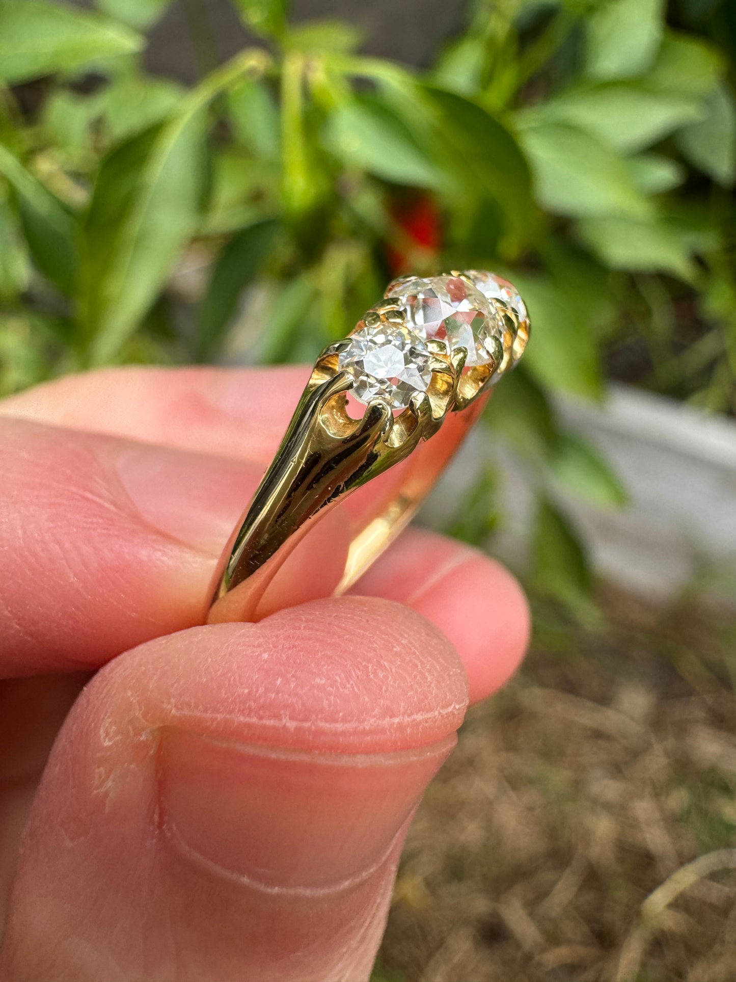 Antique 18ct yellow gold three stone 0.7ct TCW old mine cut diamond ring