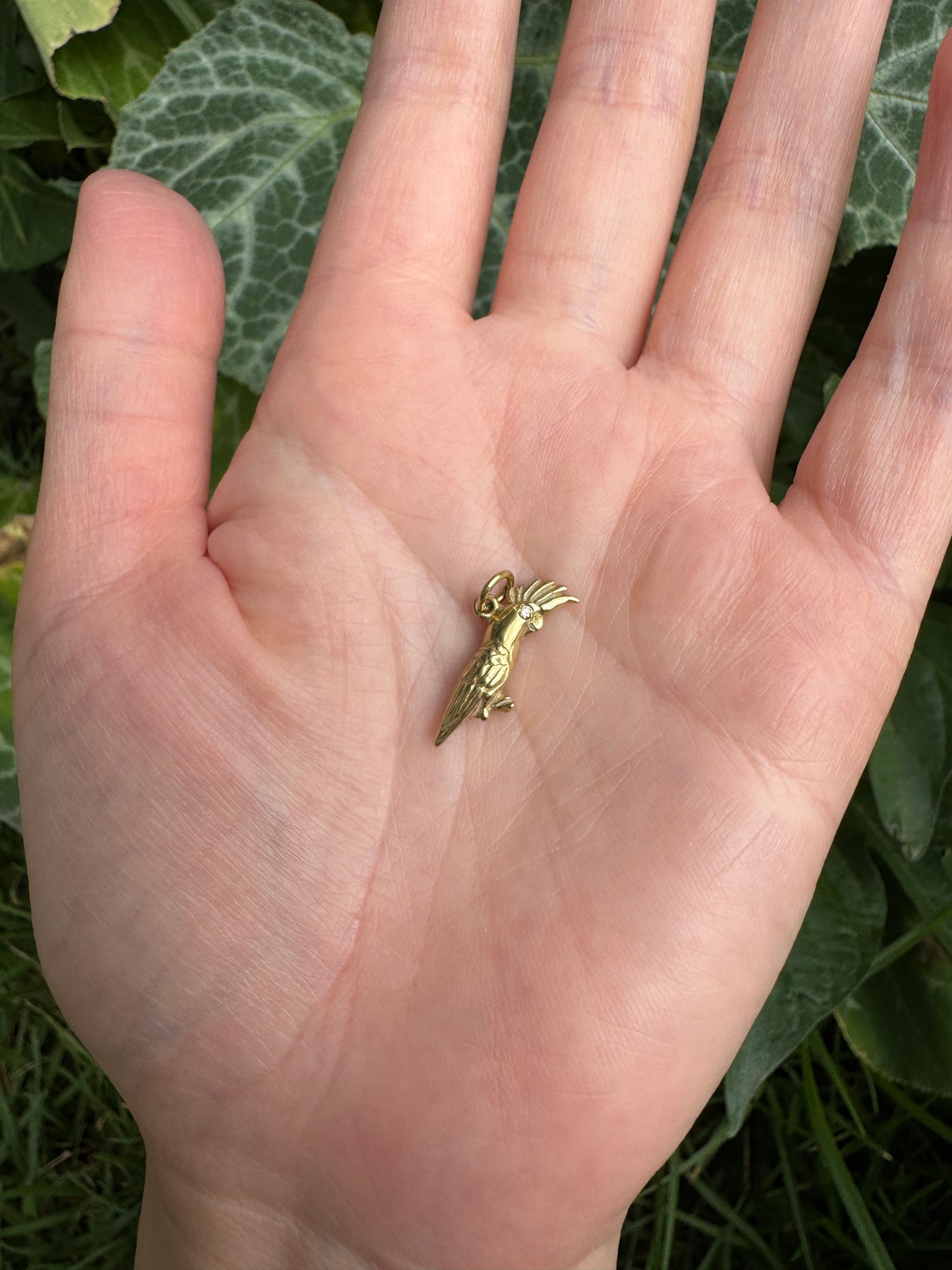 Vintage 18ct yellow gold cockatoo charm with single cut diamond eyes