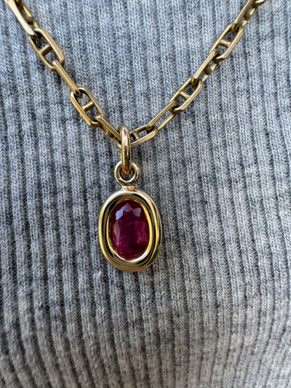 Custom 9ct yellow gold 0.8ct pink sapphire bezel set pendant