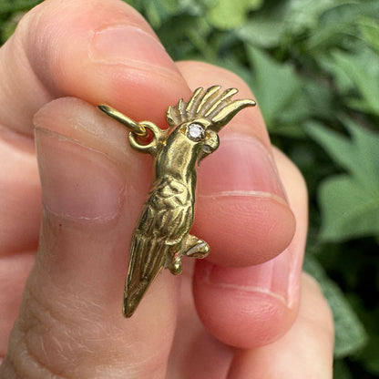 Vintage 18ct yellow gold cockatoo charm with single cut diamond eyes
