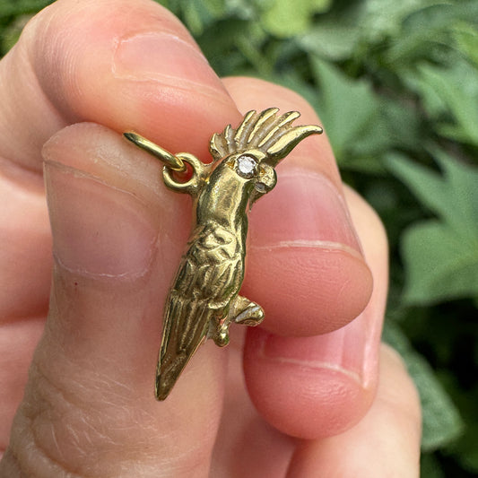 Vintage 18ct yellow gold cockatoo charm with single cut diamond eyes