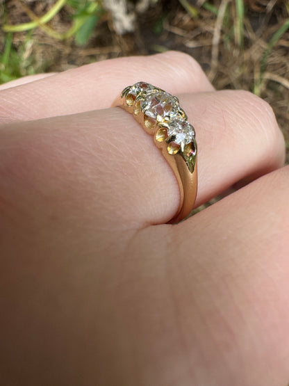 Antique 18ct yellow gold three stone 0.7ct TCW old mine cut diamond ring