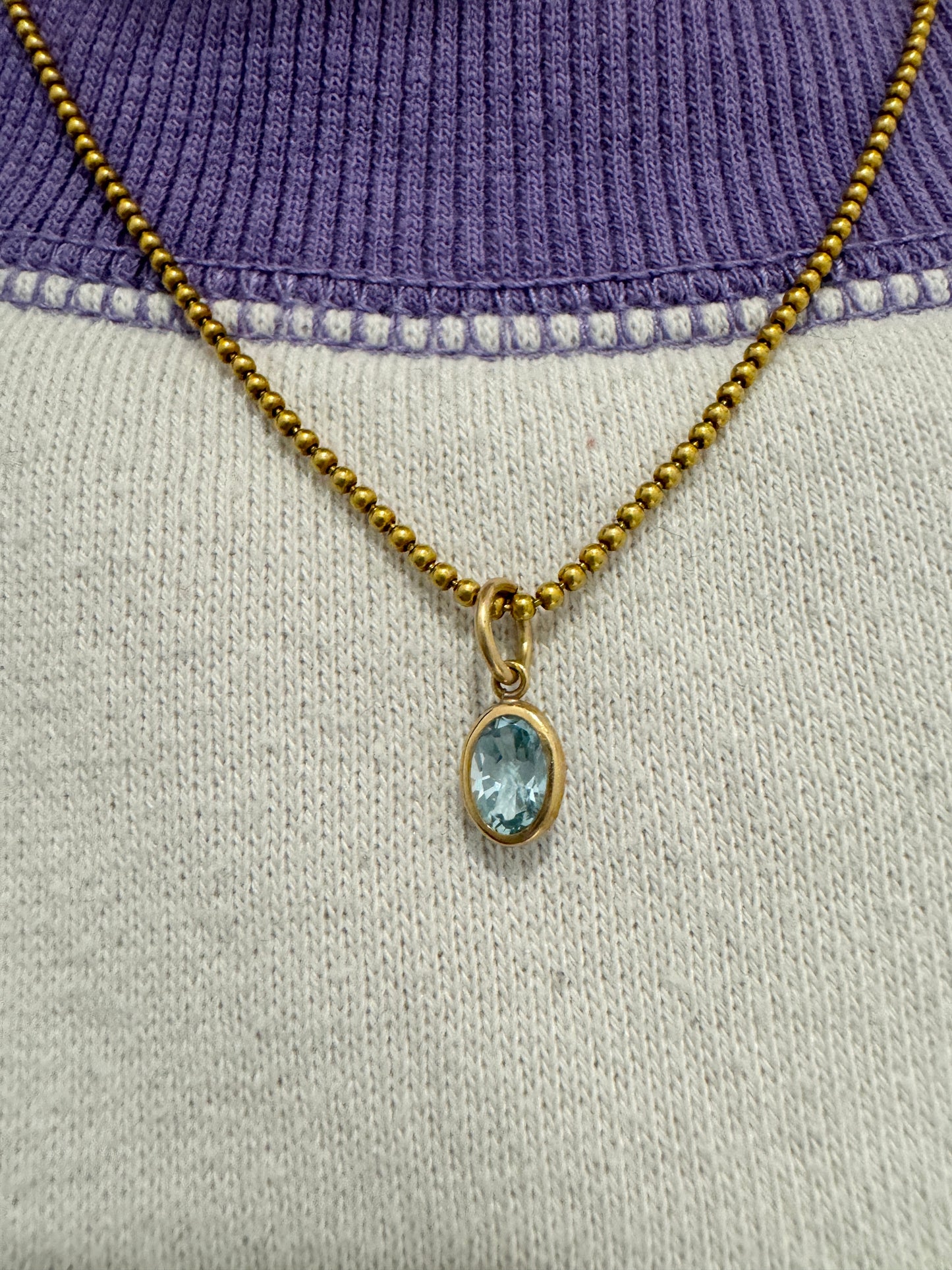 Vintage 9ct yellow gold blue topaz oval charm